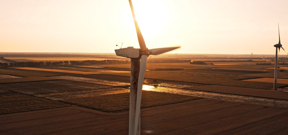 An image of a wind turbine leaking oil, ready for demolition 